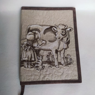 Obal na knihu Sunbonnet Sue a kráva